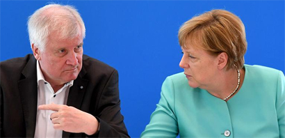ds-polit-Merkel-Zeehofer